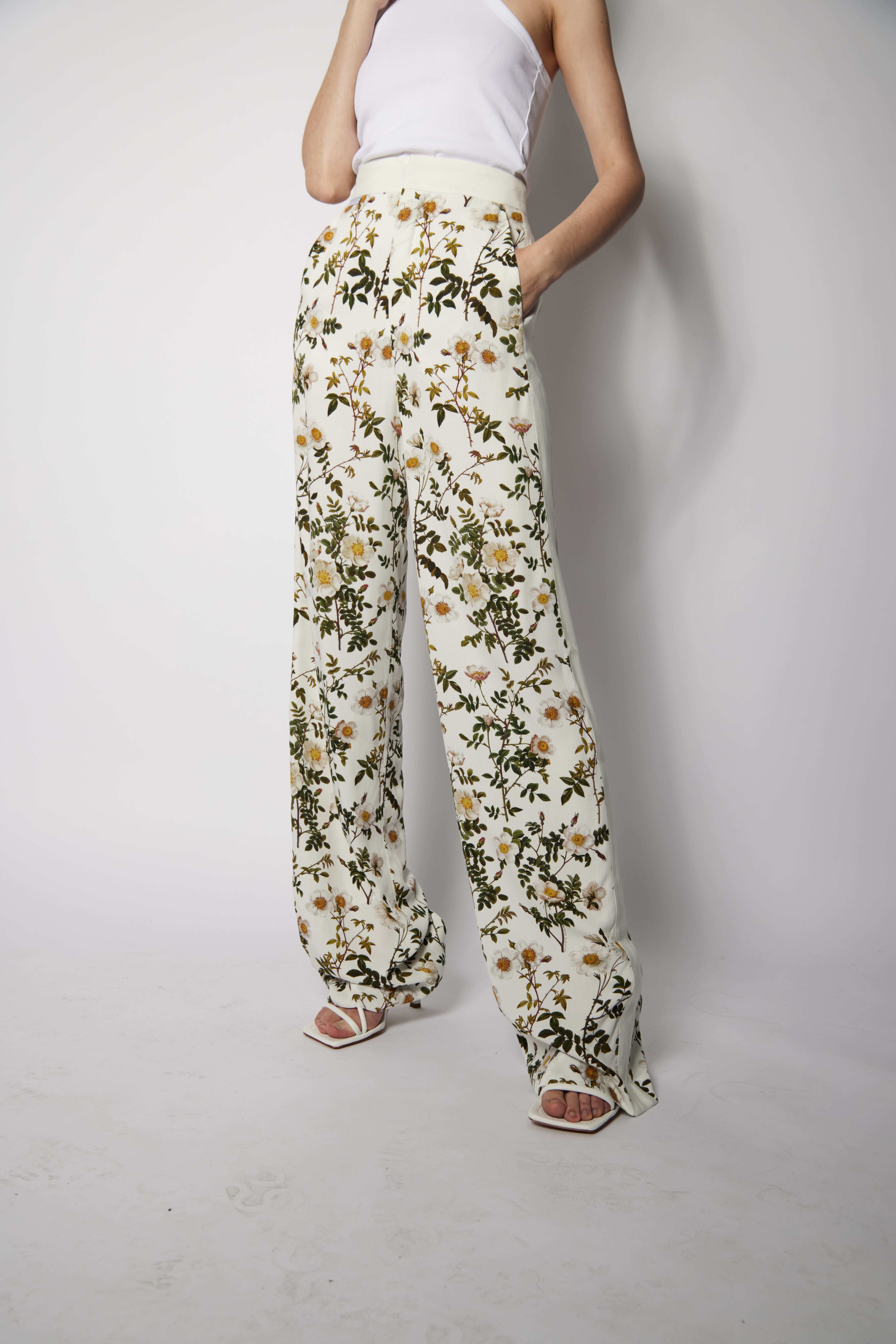 OVERSIZED TROUSERS WITH SIDE STRIPES AND ALL OVER PRINT